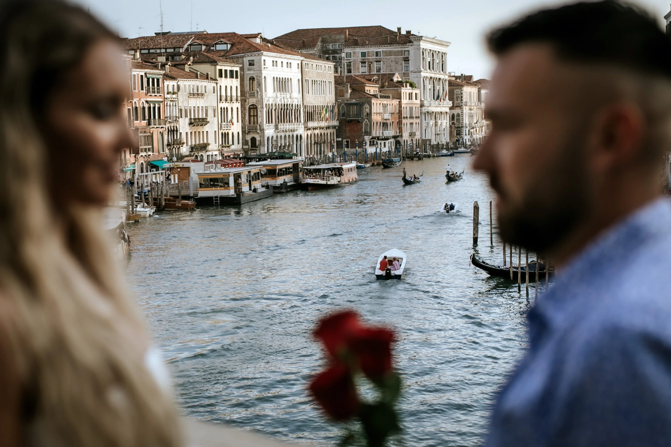 Couple in soft focus with the Grand Canal beyond
