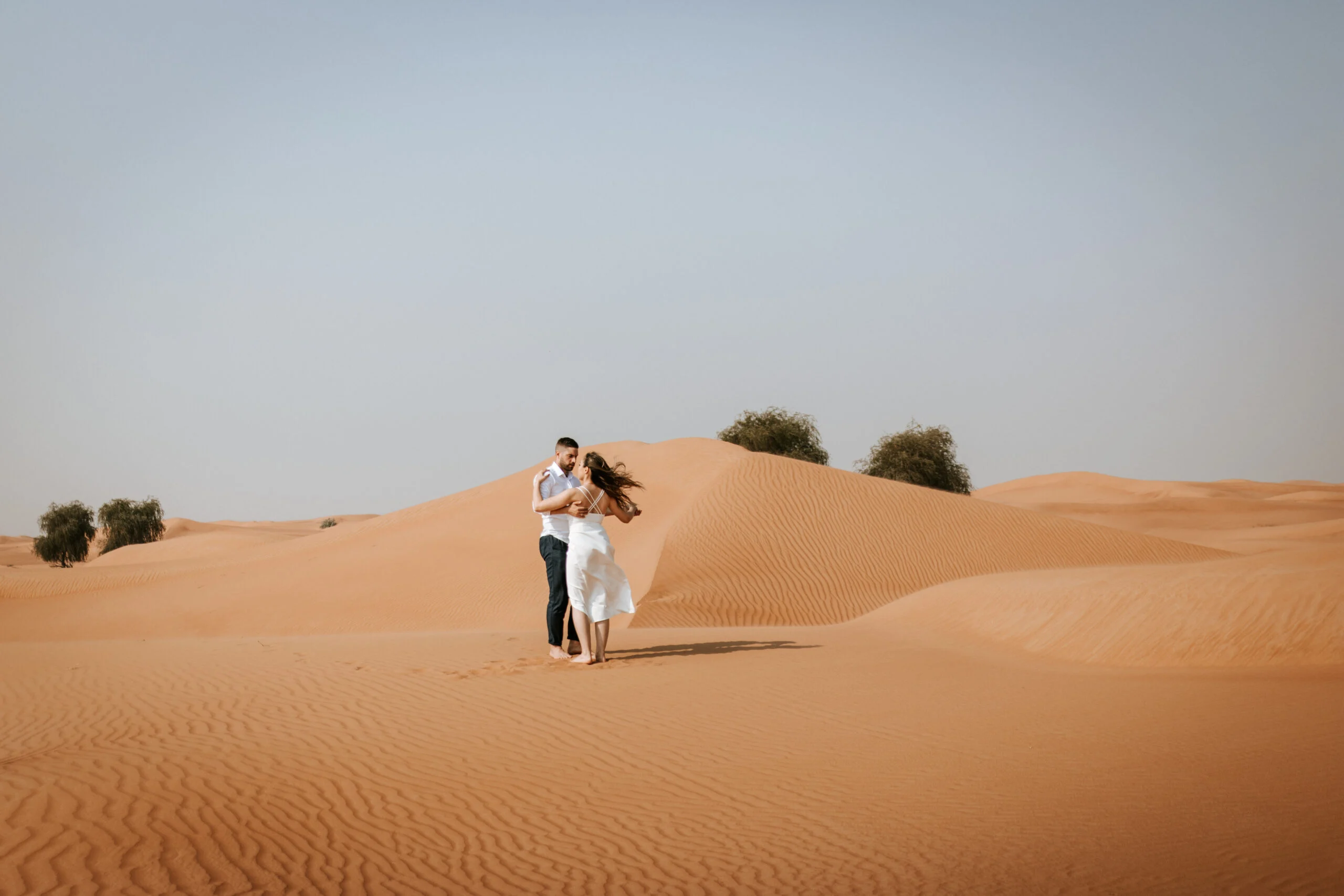 Couple embracing in the desert