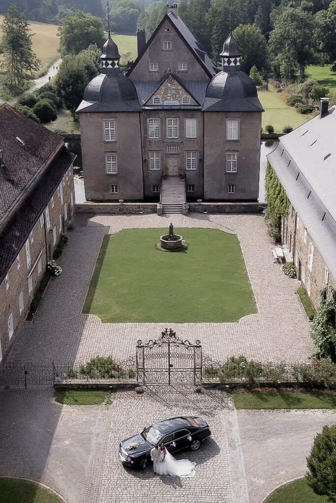 Aerial view of the German manor house and its courtyard where the wedding was held