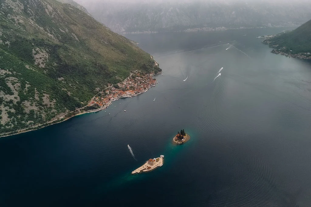 Aerial view of the Bay of Kotor with a small island in the middle